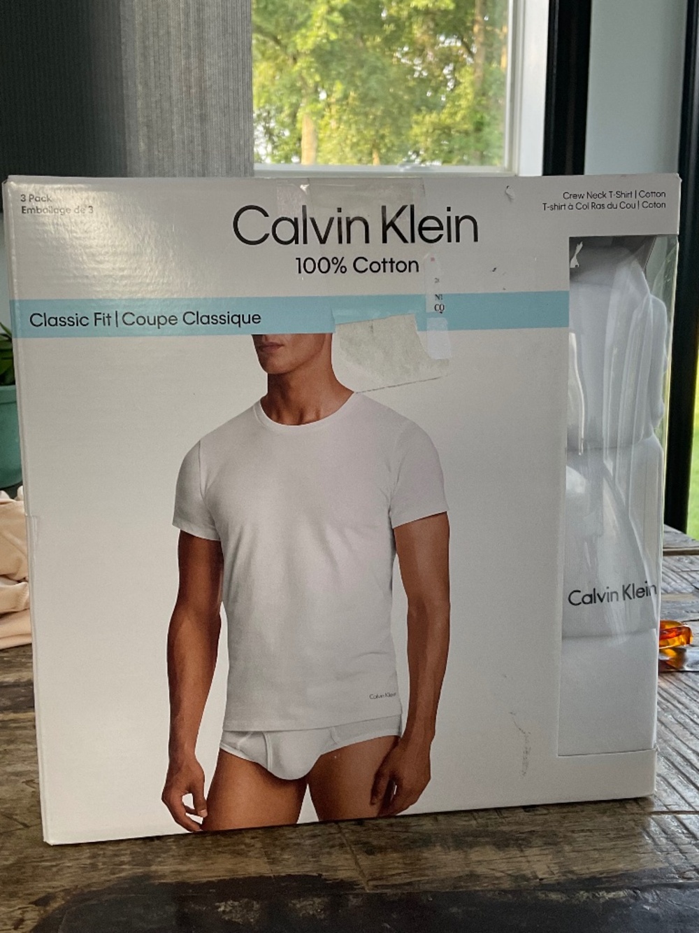 Calvin Klein white tee shirts,new in box.L.